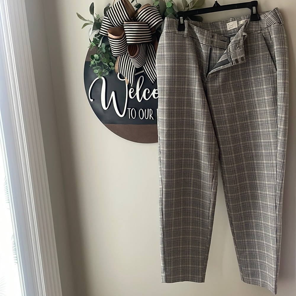 Black and white striped Capris dress pants.